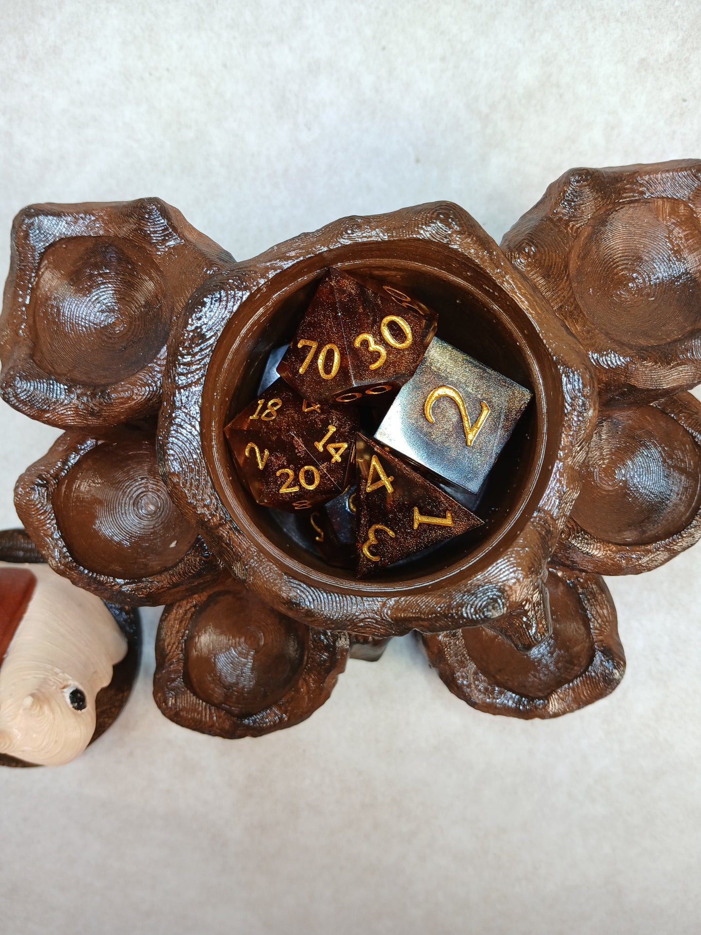 Dice guard and storage Snail on stump.