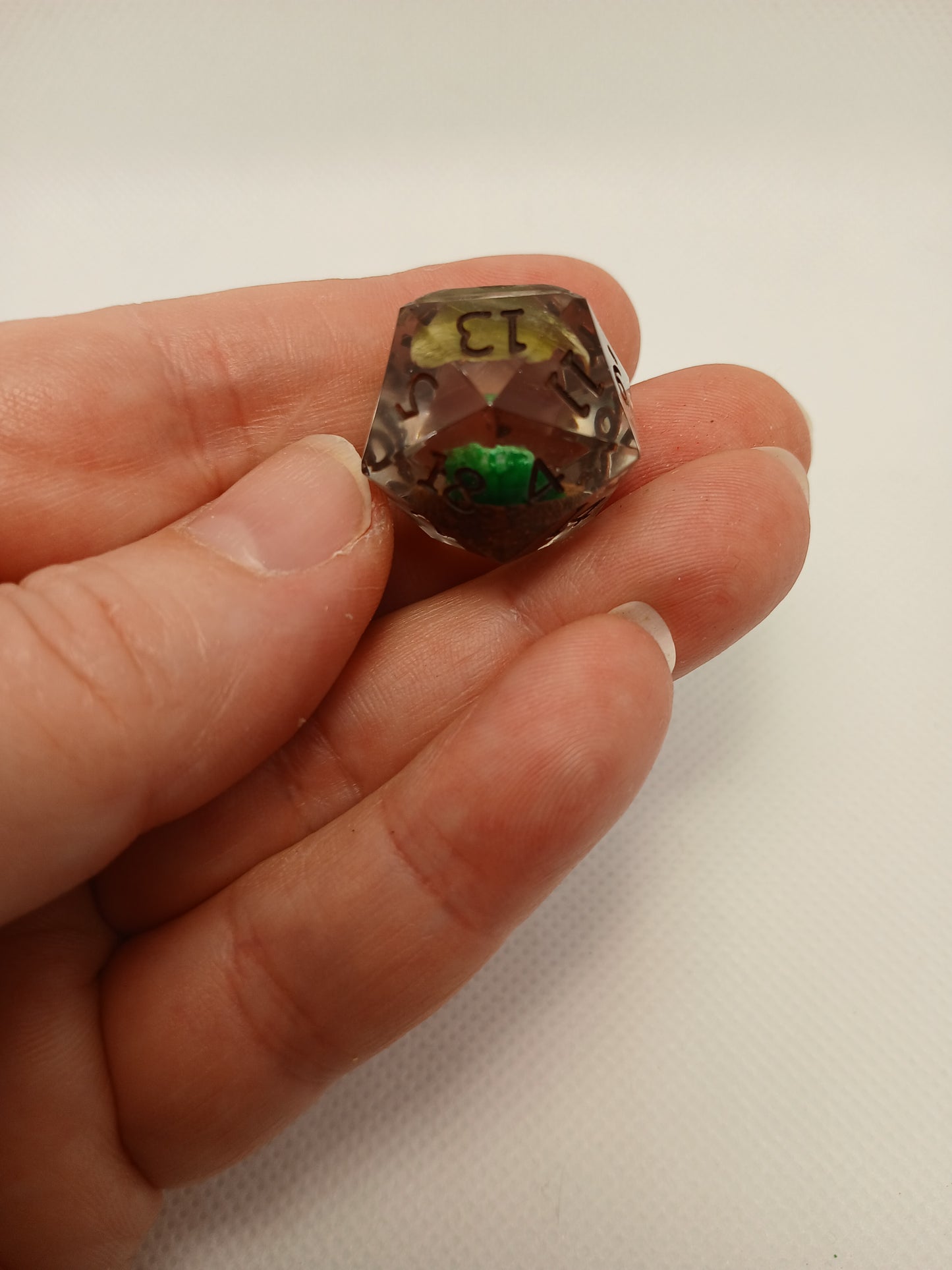 Dice D20 frog in a leaf