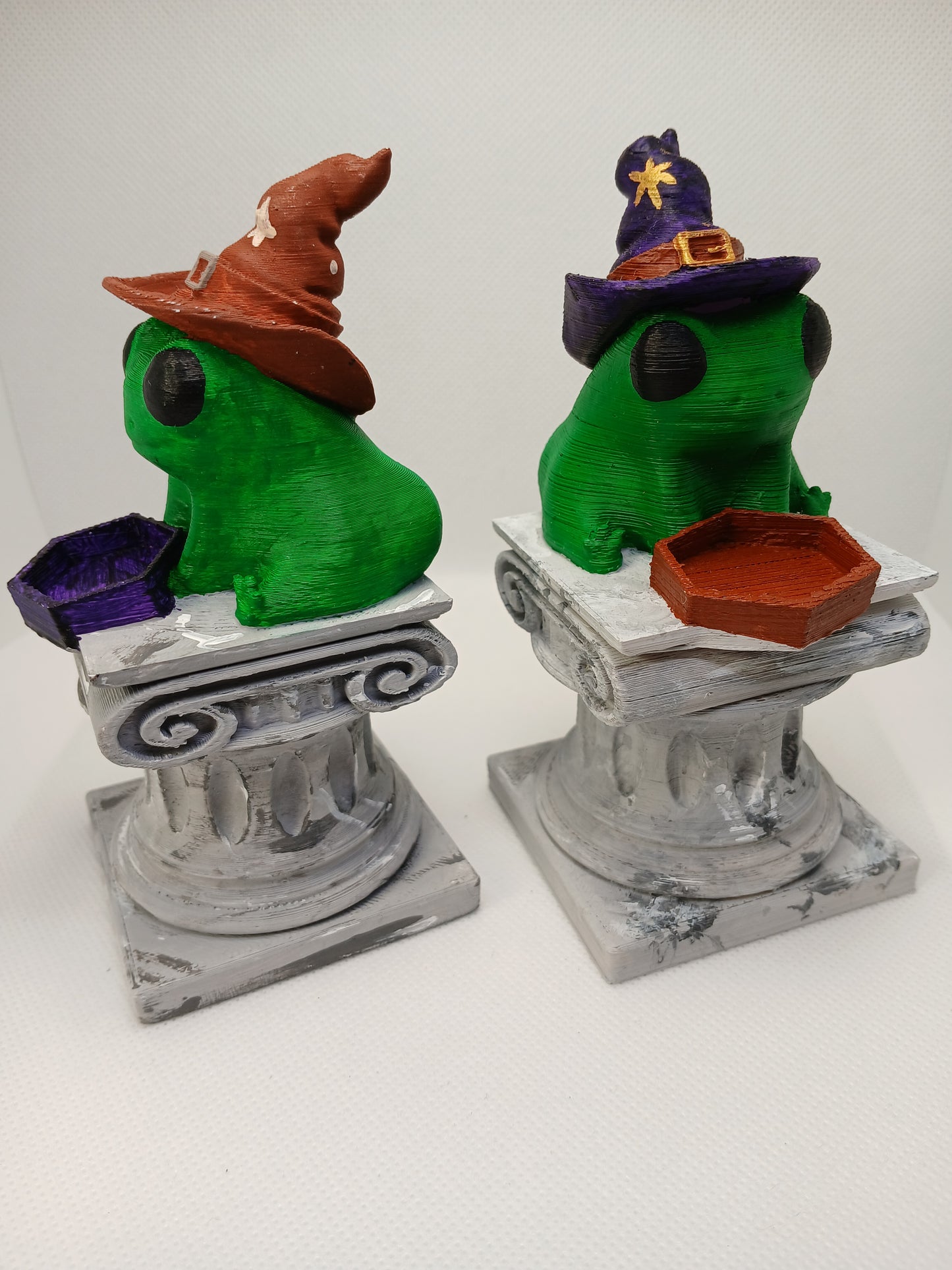 Dice holder Freddie the Frog on pedestal