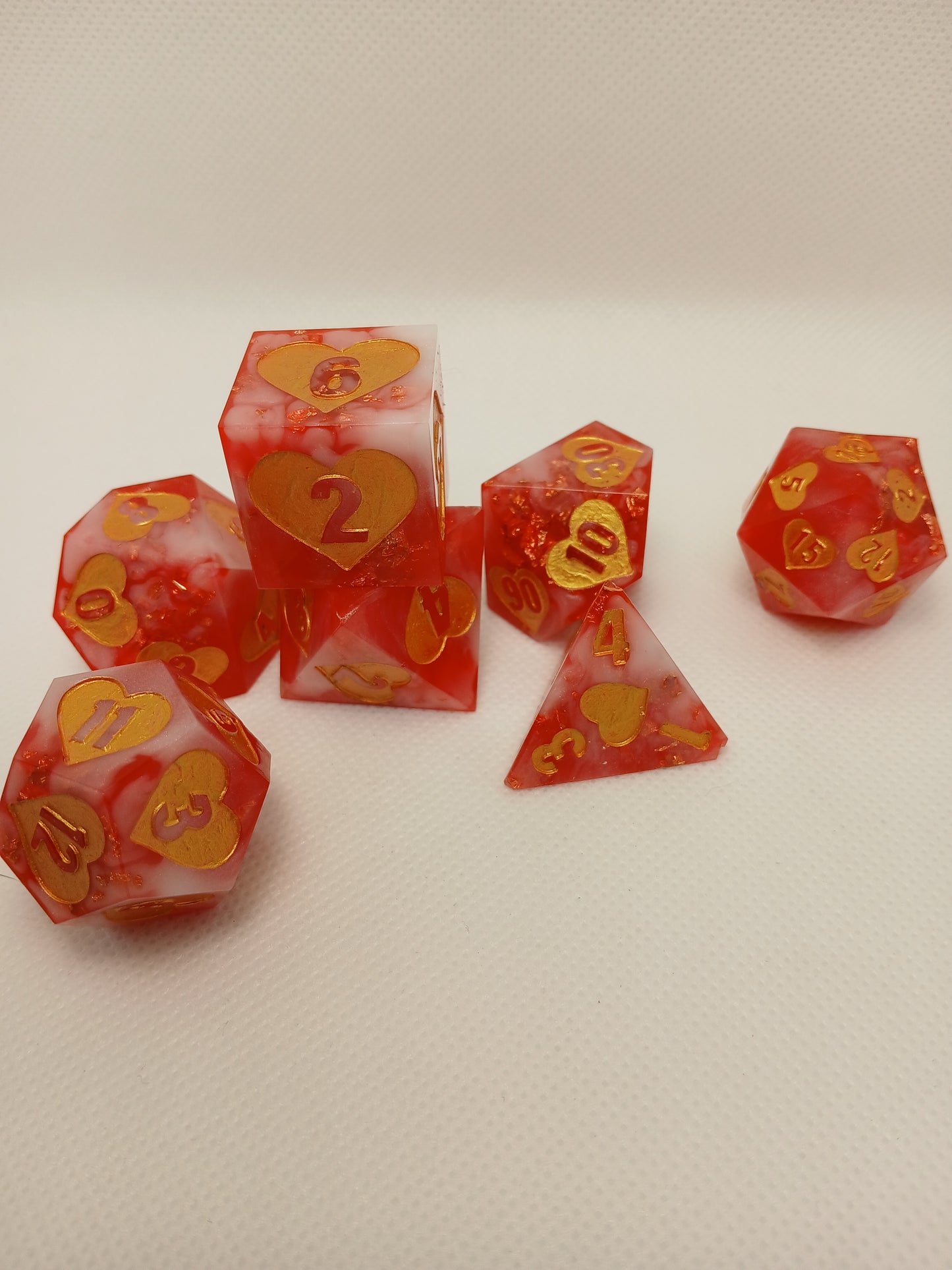 Dice set rosa/guld/vita med siffror i guld. JUMBO