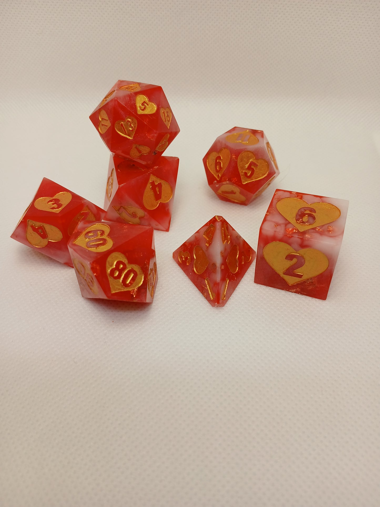 Dice set rosa/guld/vita med siffror i guld. JUMBO