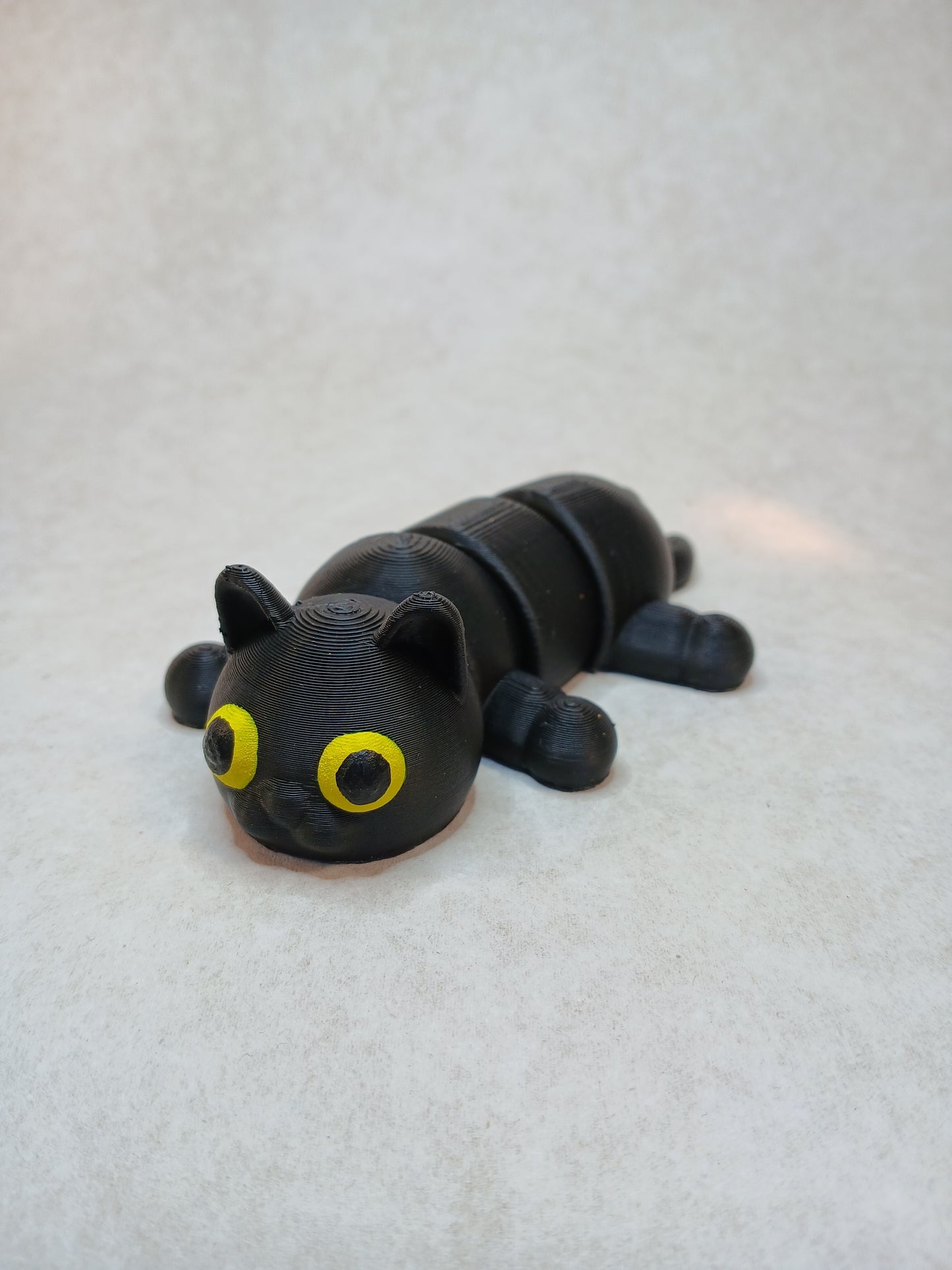Articulated Black cat